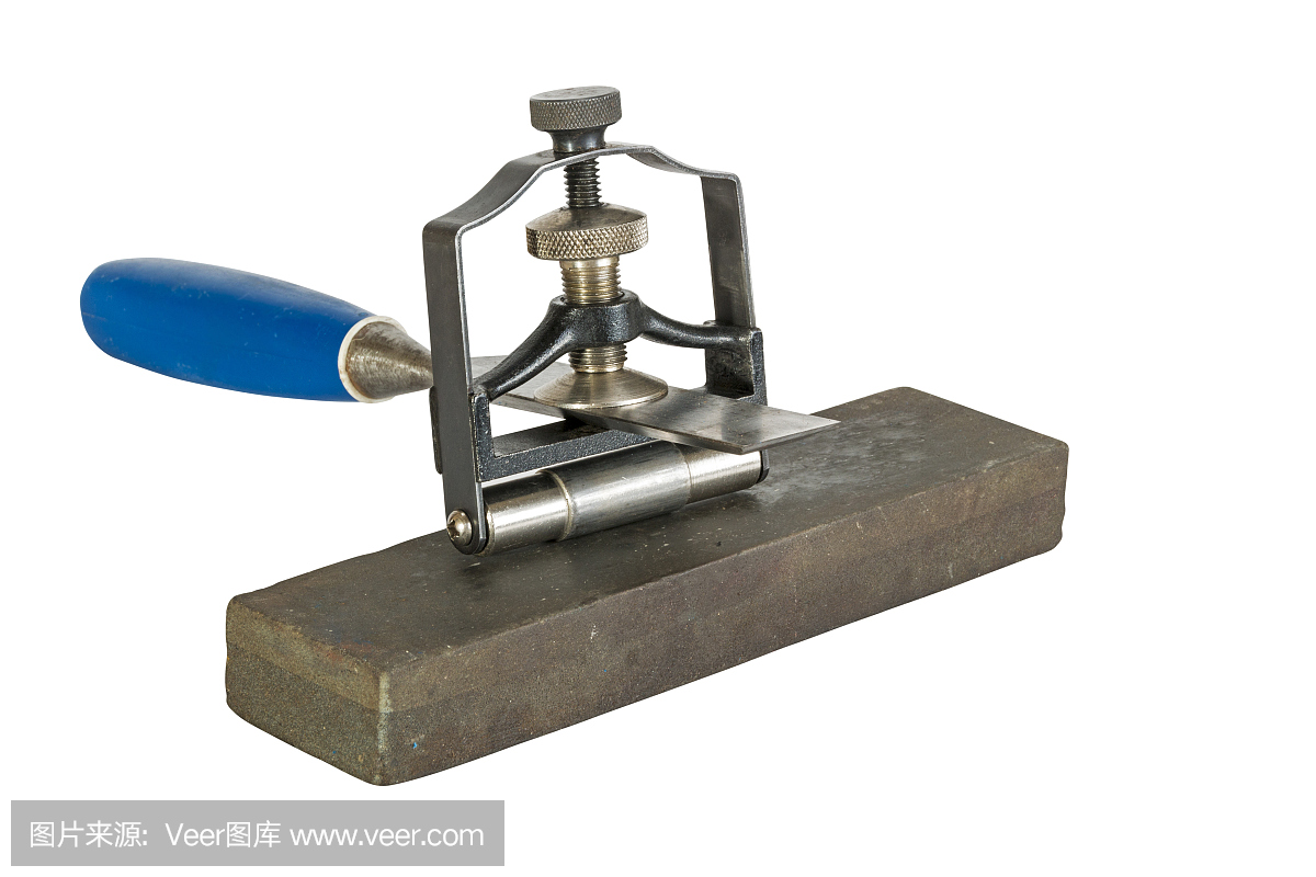 在磨石磨具上夹角导向夹具的凿子
